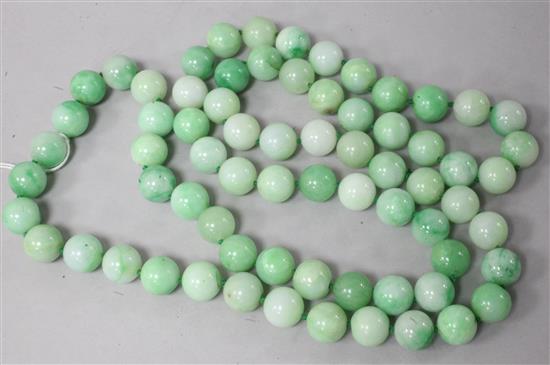 A single strand jade bead necklace, 47in.
